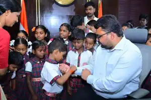Children Celebrate Raksha Bandhan by Tying Rakhis to Collector Badawat Santosh