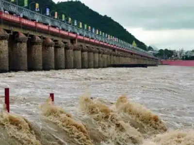Prakasam Barrage Floodgates Opened Amid Rising Krishna River Levels