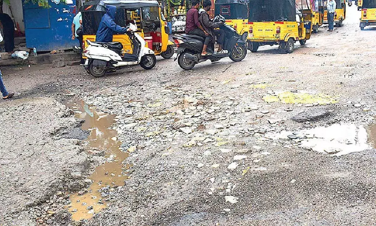 Heavy Rains Wreak Havoc on Hyderabad Roads; Potholes and Craters Challenge Commuters
