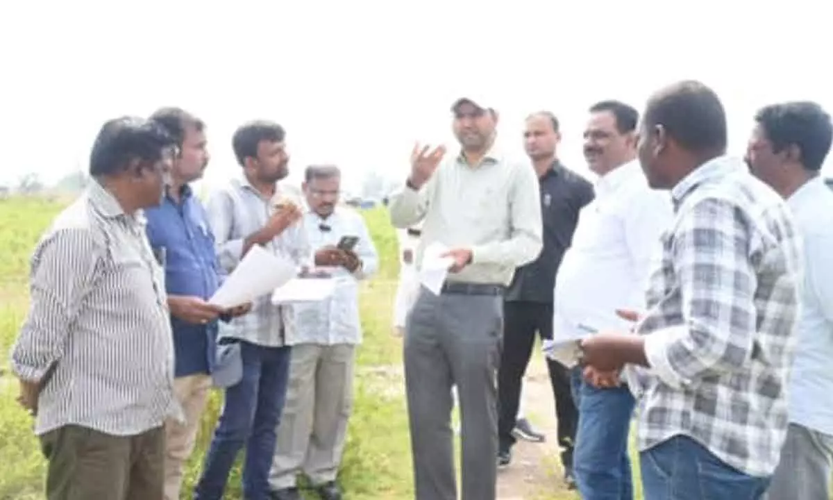 District Collector Urges Swift Resolution of LRS Applications Following Field Inspection in Erravalli