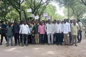 Farmers Stage Protest Against Power Cuts at Sub-Station in Asifabad