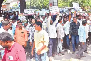 GO 317: Employees Stage Protest at Gandhi Bhavan, Urge for Resolution