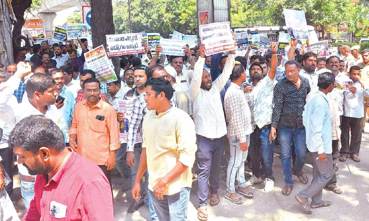 GO 317: Employees Stage Protest at Gandhi Bhavan, Urge for Resolution