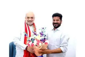 Revanth meets Amit Shah, presents funding wish-list