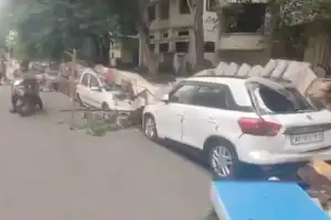Wall Collapse Damages Five Vehicles in Vijayawada