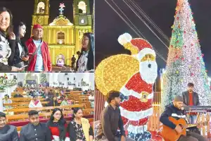 Church bells ring as the city shines with festive cheer