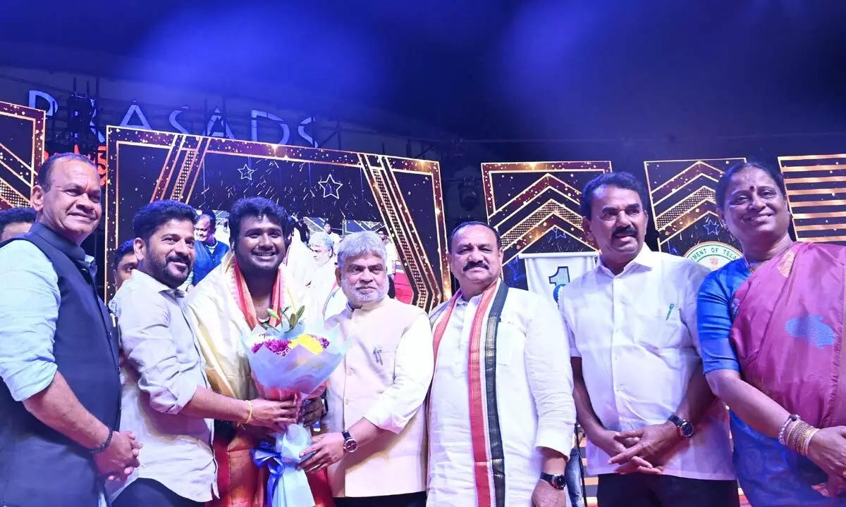 CM honors singer Rahul Sipligunj at Praja Palana Vijayotsavalu