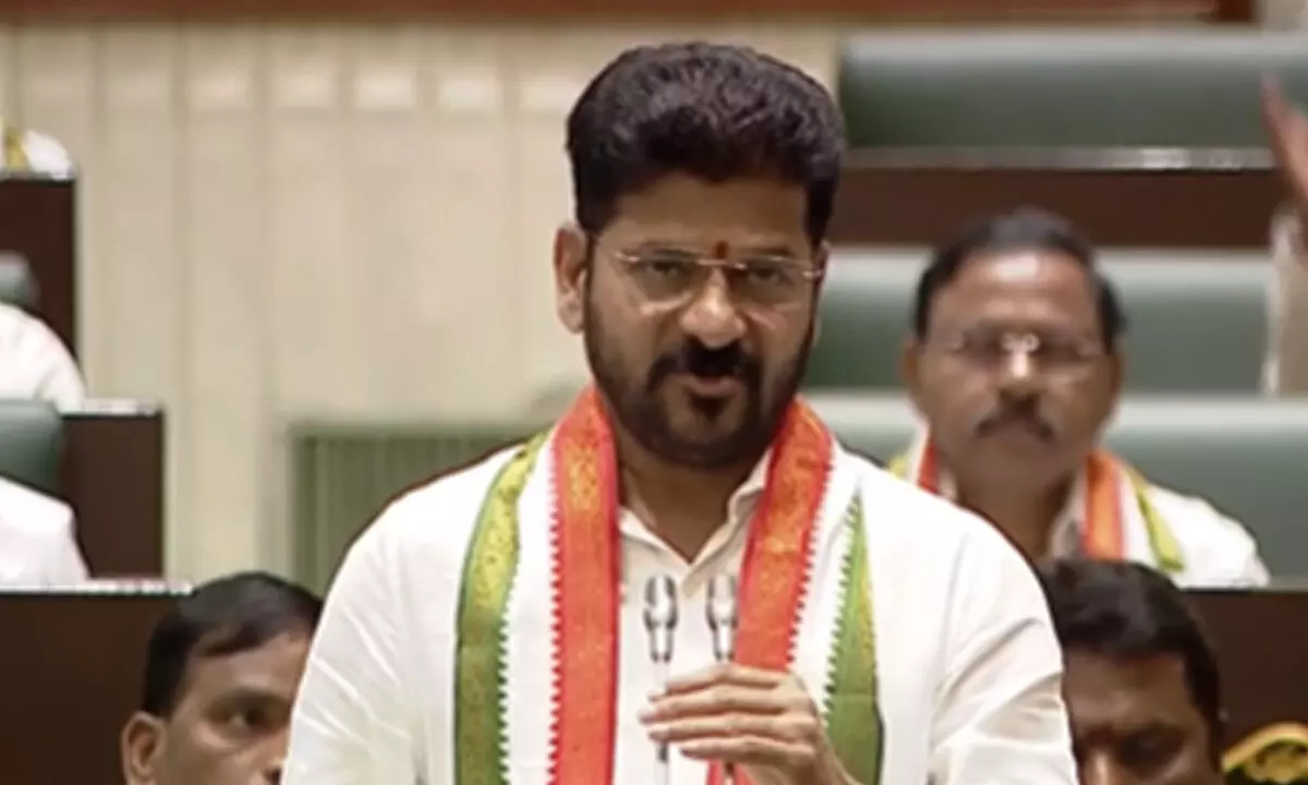 CM Revanth Reddy Pays Heartfelt Tribute to Telangana Mother Statue