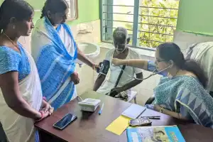 DMHO Dr. Swarajya Lakshmi steps in to check patients during inspection