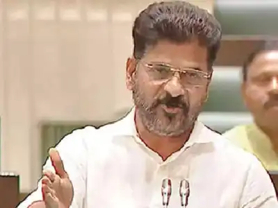 Revanth criticizes KCR over Dharani scam