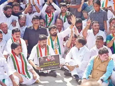Revanth leads protest against Adani at Raj Bhavan