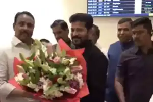 CM Revanth Back from Davos, Gets Warm Welcome in Hyderabad