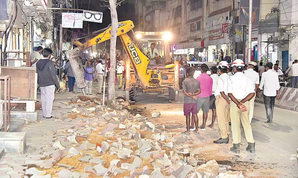 GHMC and police work together to remove city encroachments