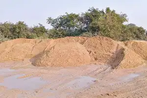 Unauthorized sand dumping at Suraram Bridge