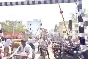 Commuters celebrate the reopening of the railway middle gate