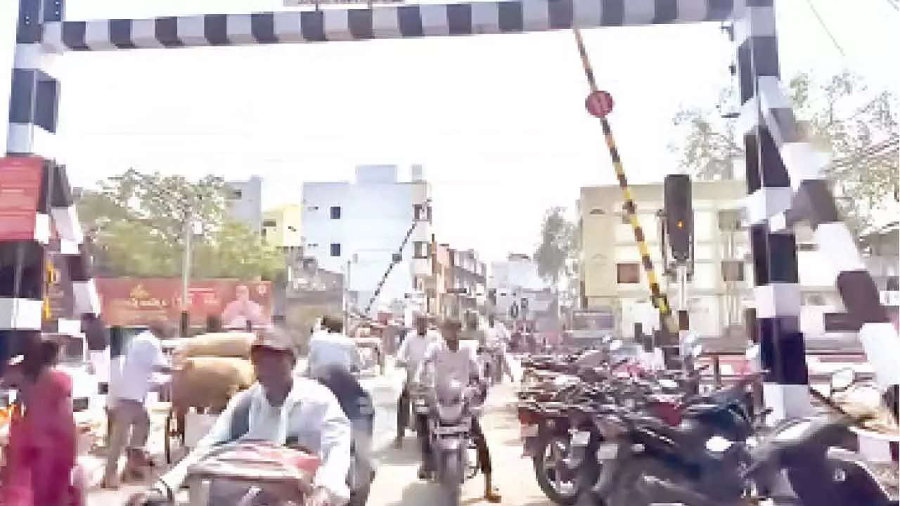 Commuters celebrate the reopening of the railway middle gate