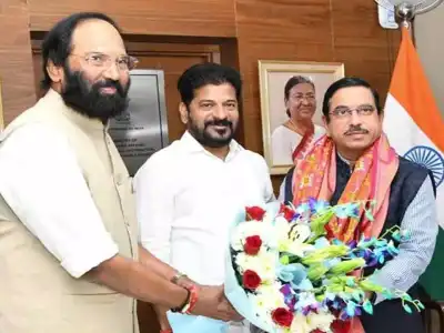 Telangana CM Revanth Reddy Meets Union Minister Prahlad Joshi to Discuss Pending Dues