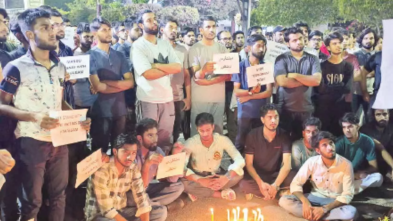 MANUU students organize candlelight march