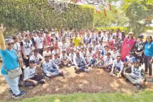 Students and volunteers work together to clean Kapra Lake
