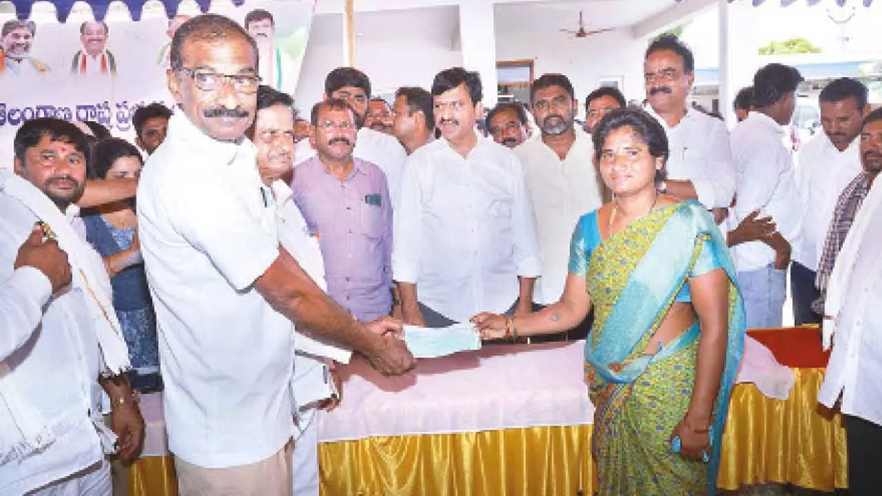 Ponguleti hands out KL checks