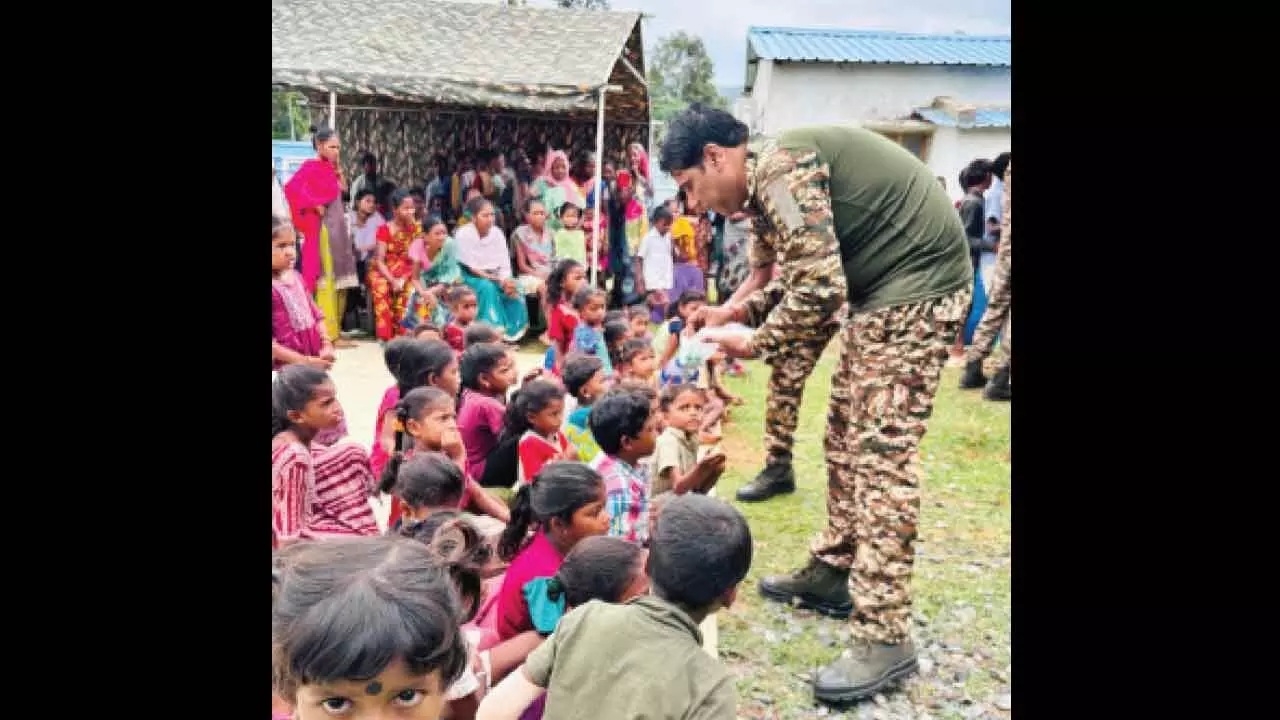 CRPF 212 Battalion gives supplies to tribal people
