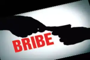 City official caught taking bribe