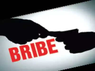 City official caught taking bribe