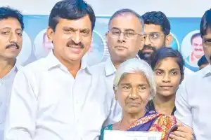 Minister Ponguleti gives Indiramma house documents to beneficiaries in Kothagudem