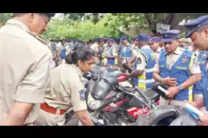 Police officer checks patrol vehicles and bikes