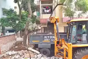 Residents celebrate removal of Habsiguda barrier wall