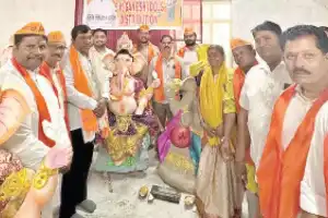 BJP leader gives out Ganesh idols, calls for peaceful celebrations