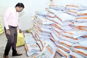 Collector checks fertilizer supply