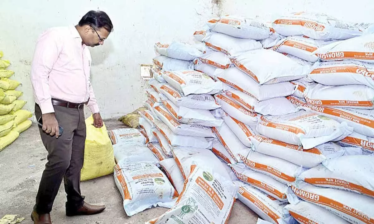 Collector checks fertilizer supply