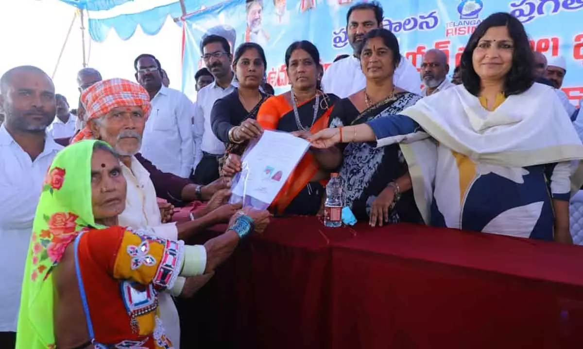 Land Ownership Papers Given to Families Displaced by Udandapur Reservoir