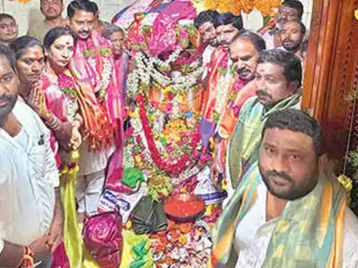 TSTDC leader presents offering at Mutyalamma temple