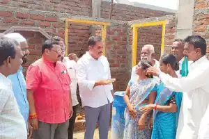 Ade checks construction in Boath hamlet