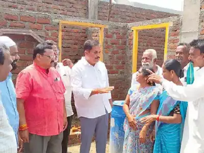 Ade checks construction in Boath hamlet