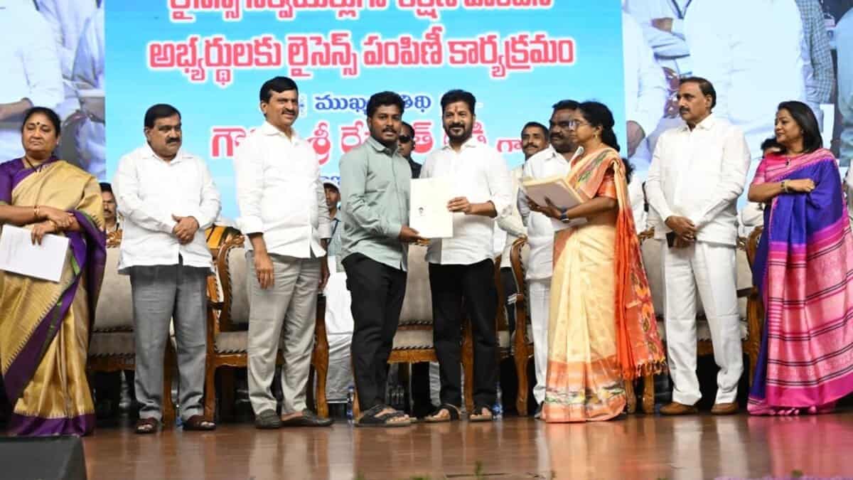 Chief Minister Revanth Reddy gives licenses to land surveyors in Telangana