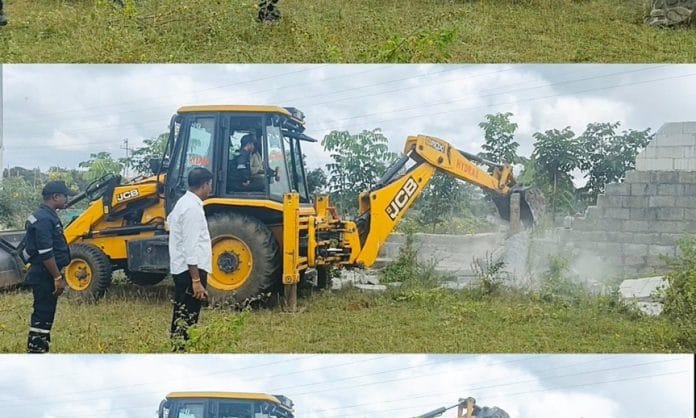 Pocharam Plot Owners Rejoice as HYDRA Tears Down Obstructing Wall