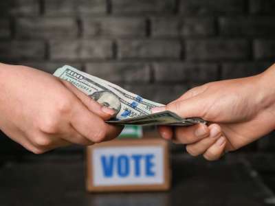 Political parties accused of giving money to voters before election