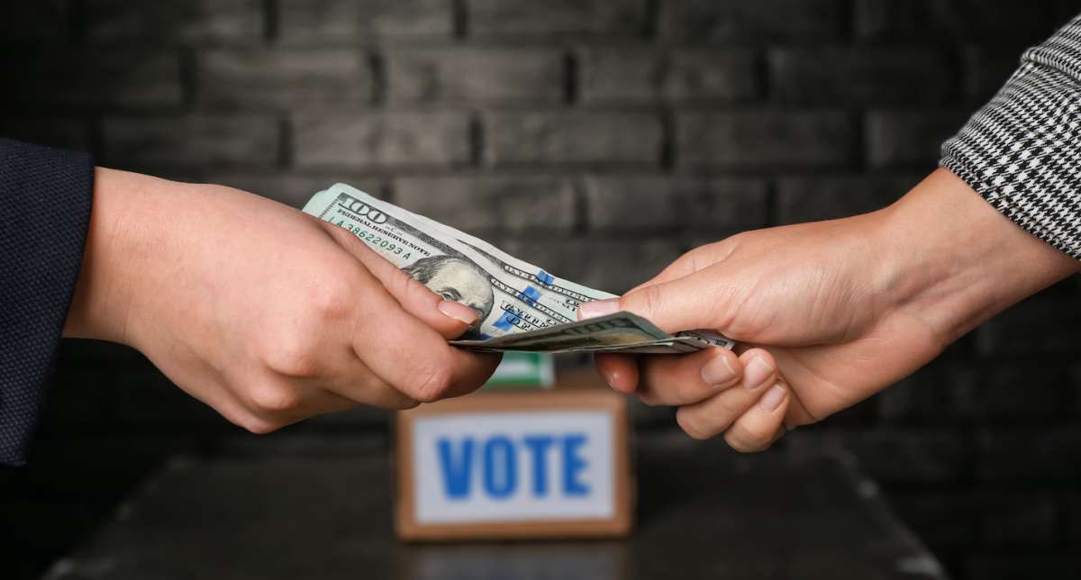 Political parties accused of giving money to voters before election