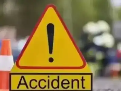 Travel bus collision overturns tractor injuring four